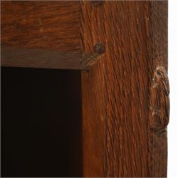 Rabbitman - oak single pedestal desk, adzed top with galleried back, with three graduating drawers with turned wooden knobs, enclosed kneehole with adzed detailing throughout the panelling and supports, with carved rabbit signature, by Peter Heap of Wetwang