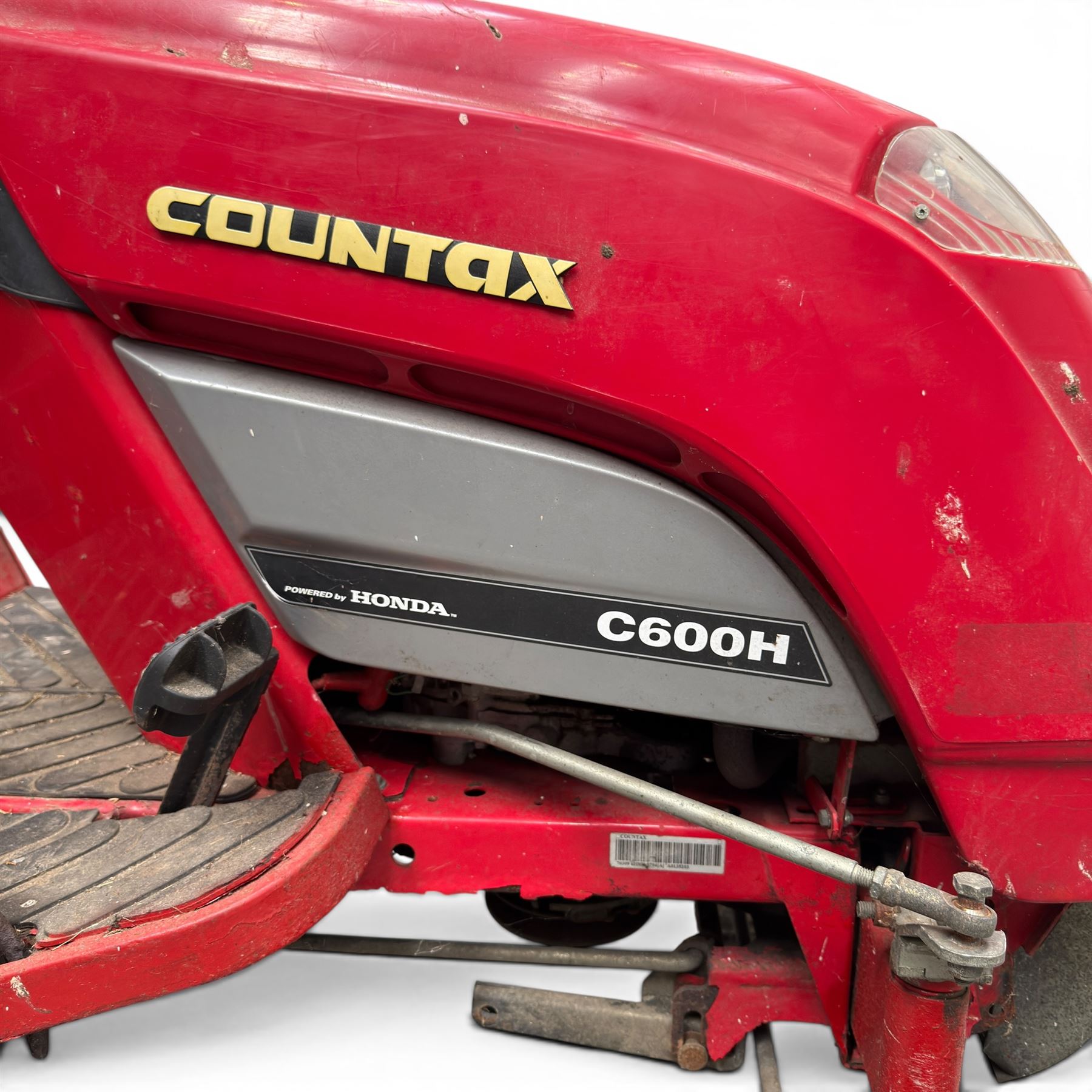 Countax C600H - ride on lawnmower / yard tractor with Honda engine, black seat and red bodywork.