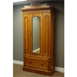  Victorian satin walnut single wardrobe, carved pediment above single mirror glazed door, singe drawer to base, W105cm, H218cm, D46cm  
