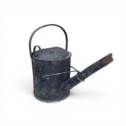 Eight early 20th century galvanised watering cans
