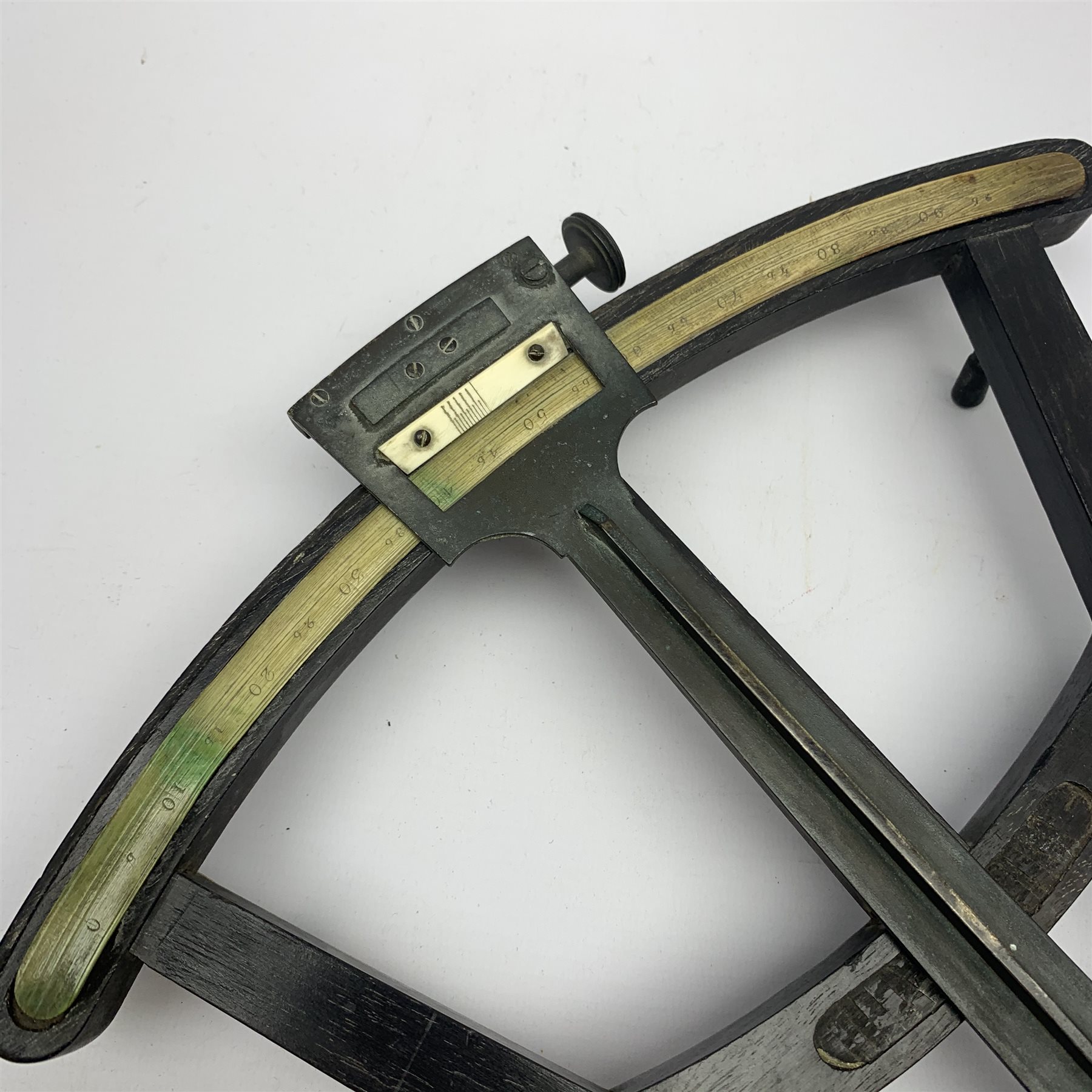 19th century octant, the rosewood framework with brass fittings and inset ivory scale, aperture for inset maker's plaque, L32cm