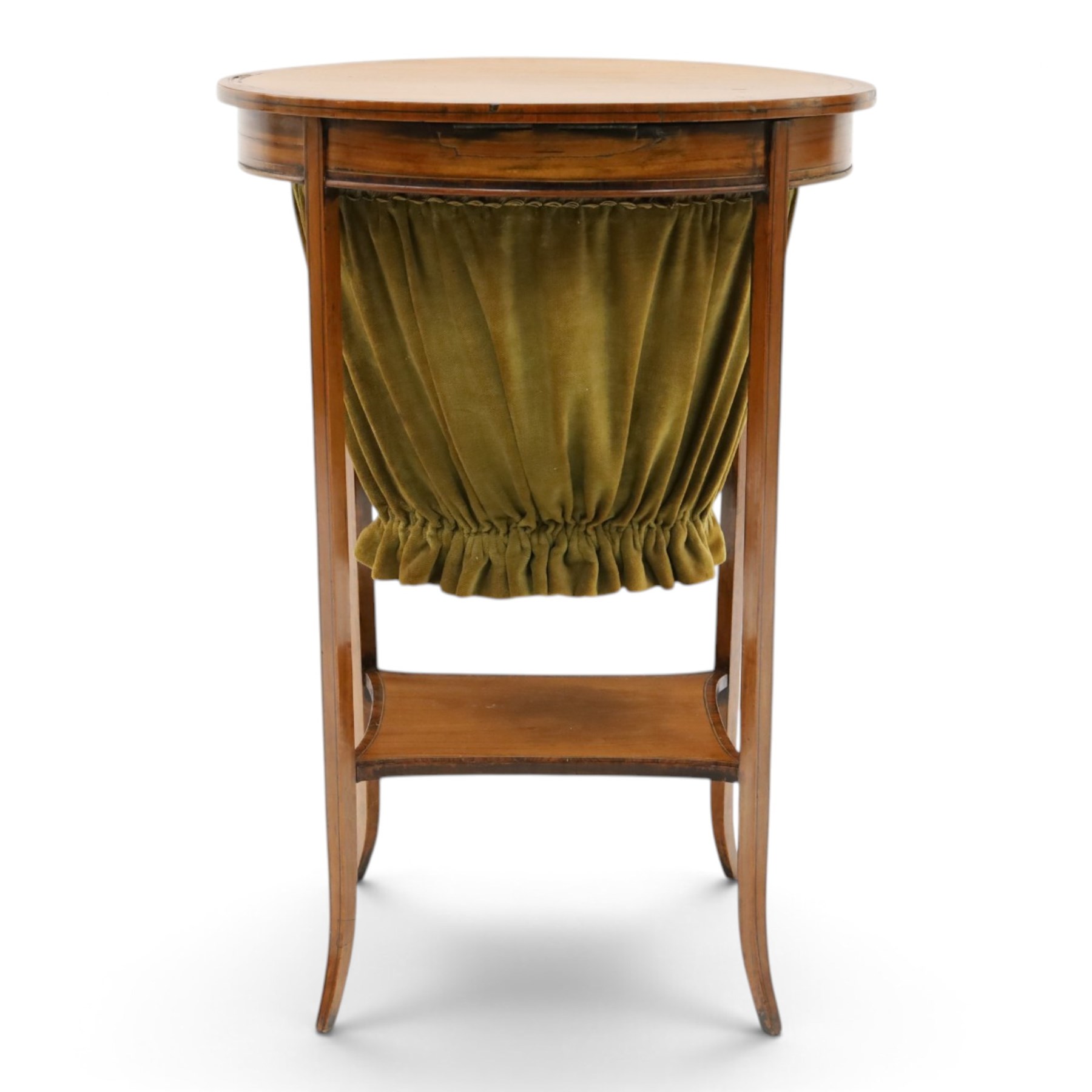Edwardian inlaid satinwood oval sewing or work table, crossbanded and ebony-strung hinged top enclosing fitted compartment and olive-green upholstered well, raised on square tapering splayed supports united by under-tier 
