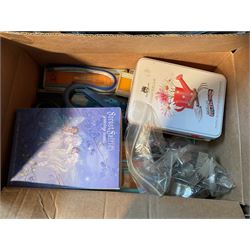 Two Singer sewing machines, model numbers 527 and 457, together with various Singer sewing machine parts, and a selection of sewing related accessories, to include threads, sewing needles, etc.