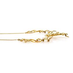 Edwardian gold split pearl flower head and foliate necklace, stamped 15ct