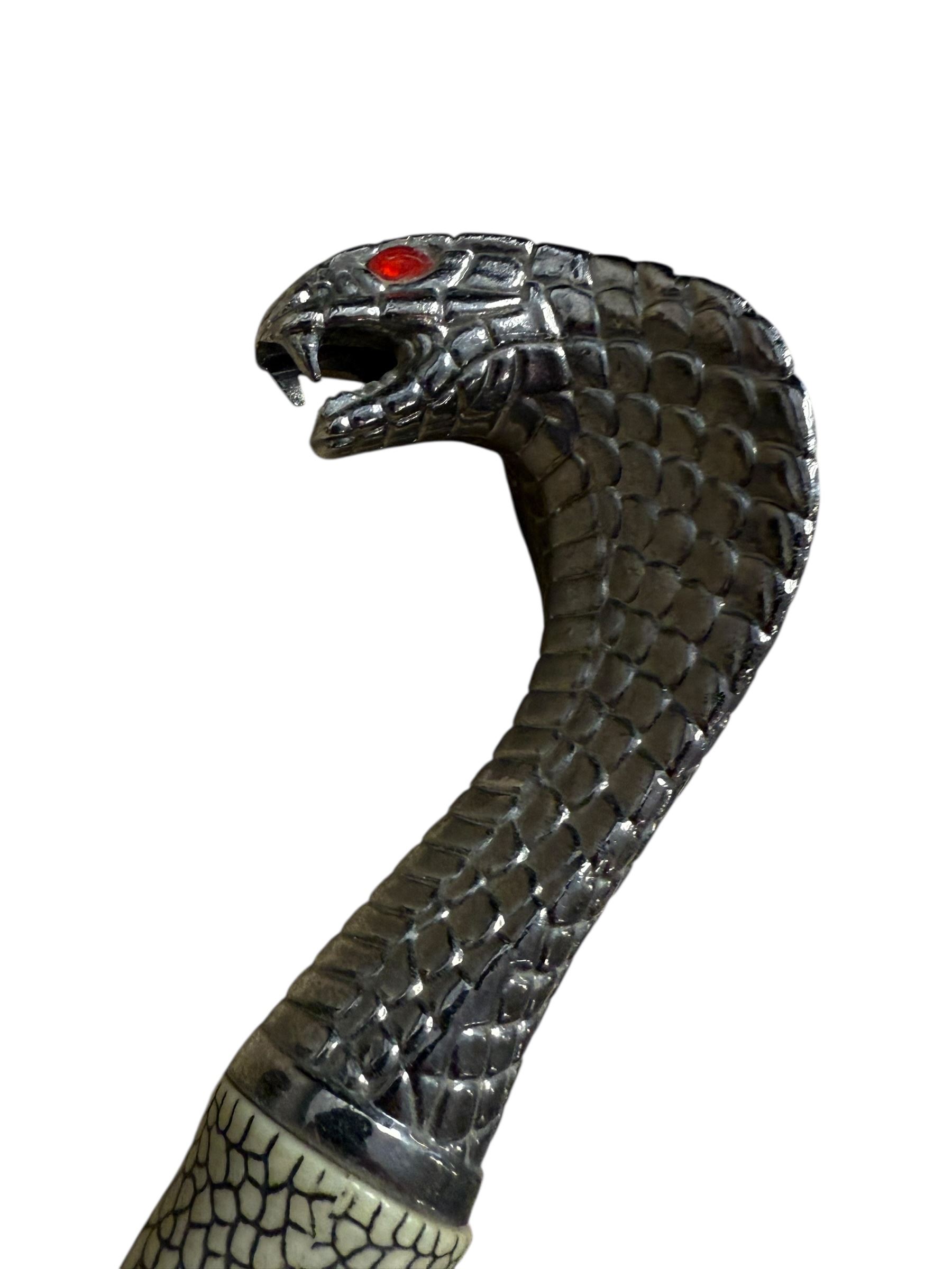 Set of three Ancient Warrior decorative swords, largest L106cm