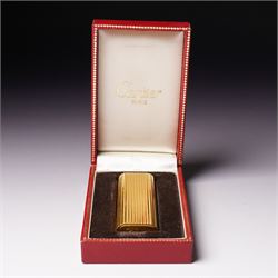 Vintage Cartier gold plated lighter with rounded edges and textured finish marked 'Cartier, Paris No16061A' and inscribed with initials in original Cartier case 