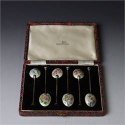 Set of six enamel coffee spoons, each decorated with guilloche enamel flowers to the under...