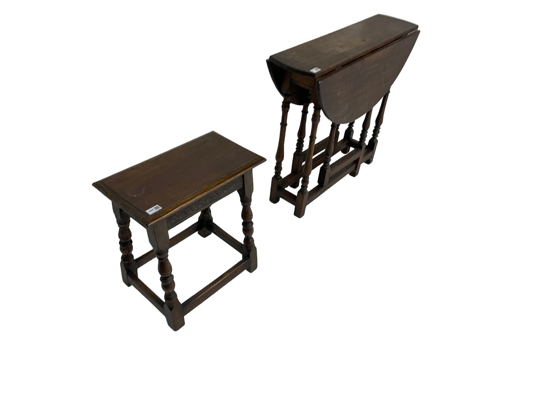 17th century design oak coffin or joint stool, rectangular top over lunette carved frieze rail, raised on turned supports (W46cm D26cn H45cm); and 19th century small oak drop-leaf gateleg table, circular top raised on turned supports (W80cm H67cm)