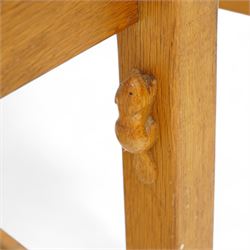 Beaverman - set of four oak dining chairs, shaped cresting rail over two shaped vertical rails, green leather upholstered drop-in seats, on octagonal supports united by plain stretchers, each carved with beaver signature, by Colin Almack, Sutton-under-Whitestone Cliffe, Thirsk