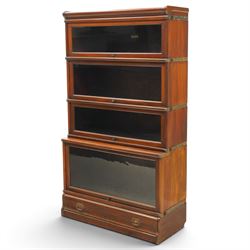 Globe Wernicke - early 20th century mahogany four-tier stacking library bookcase, the shel...