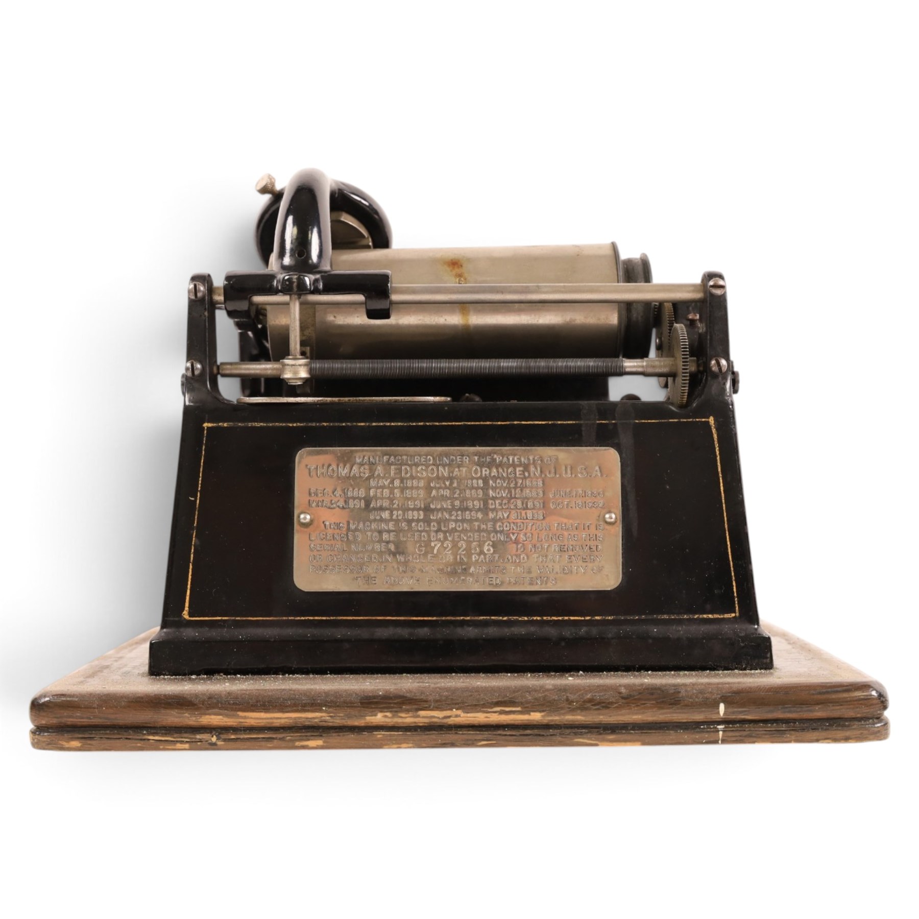 Early 20th century Edison GEM phonograph, in oak case, serial number G72256, with brass and black horn and a collection of wax cylinders