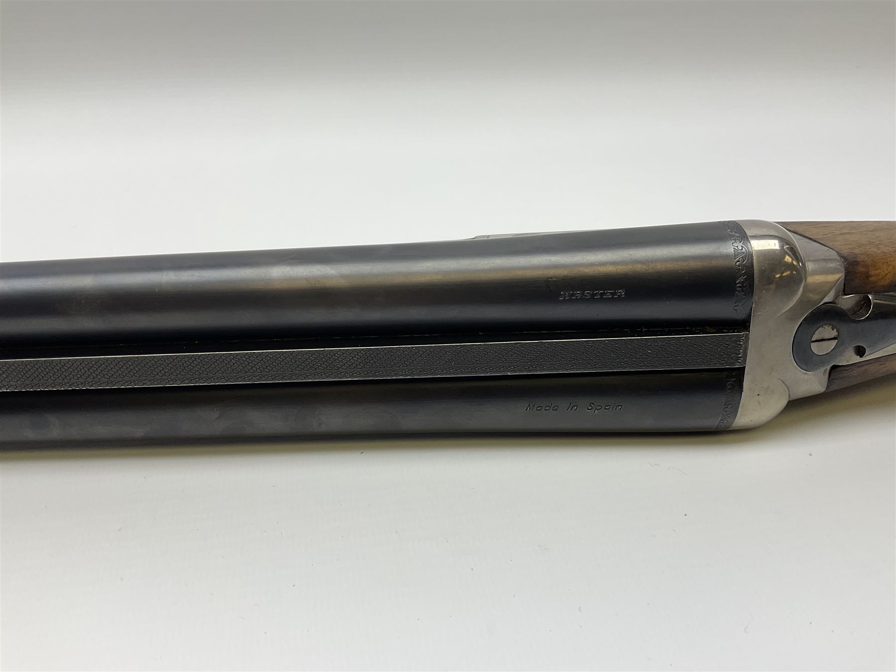 Spanish Master 12-bore side-by-side double barrel boxlock ejector sporting gun, 70.5cm barrels, pale walnut stock with chequered grip and plain fore-end and thumb safety, serial no.130828, L113cm SHOTGUN CERTIFICATE REQUIRED