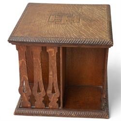 Early 20th century tabletop oak revolving bookcase, of square section upon short platform base 