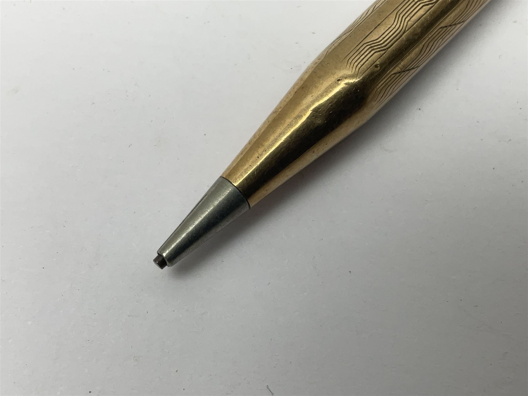 9ct gold 'Lifelong' propelling pencil, with engine turned decoration, stamped 9ct 