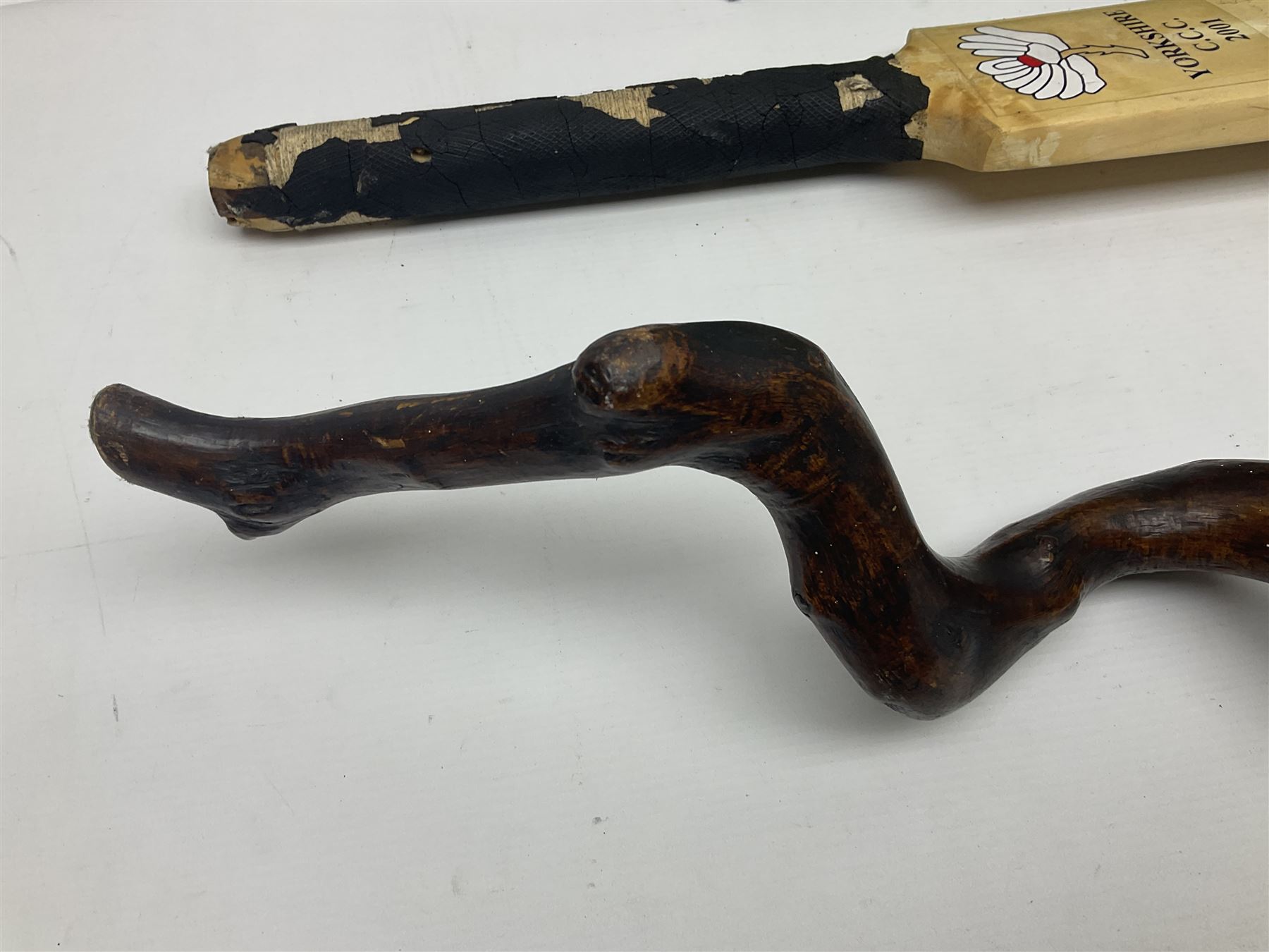 Annotated display board of clay pipes; rootwood walking stick and Yorkshire CCC signed cricket bat 2001