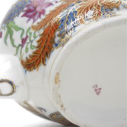 New Hall part tea and coffee service richly decorated  with a Tobacco Leaf design in pattern 274 comprising nine tea cups, eight coffee cans, ten saucers, tea pot and stand, sucrier and cover, slop bowl, milk jug and plate, circa 1800