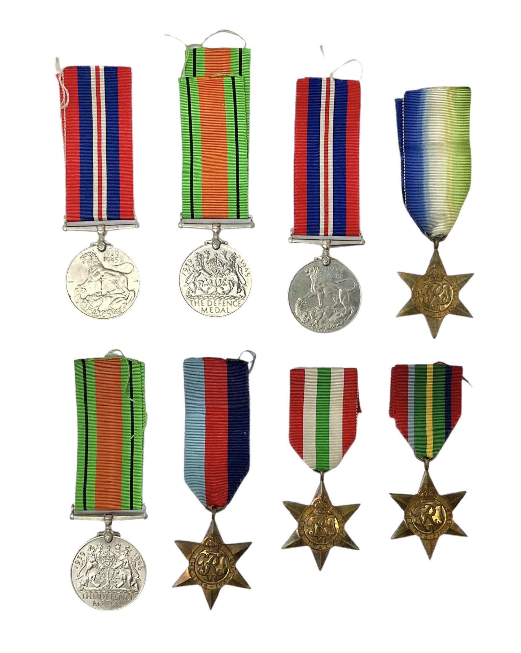 Eight WW2 medals comprising two War Medals 1939-1945, two Defence Medals, Atlantic Star, Italy Star, Pacific Star and 1939-1945 Star; all with ribbons (8) 