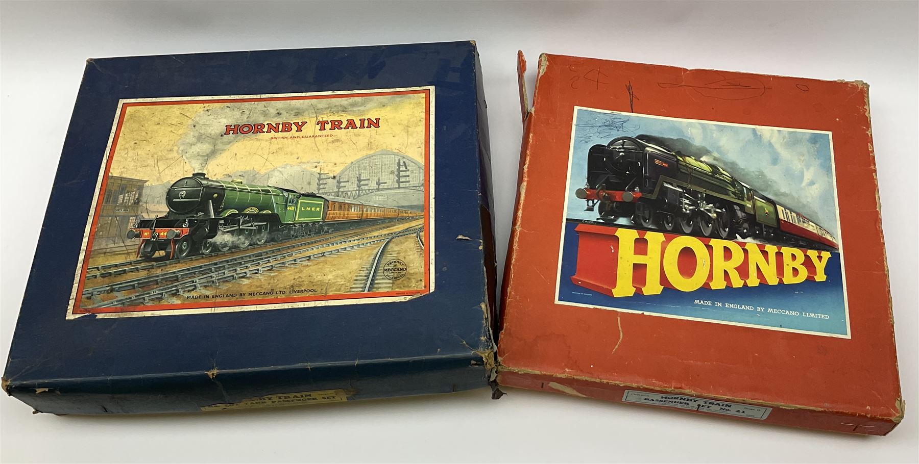 Hornby '0' gauge - Passenger Set No.21 with clockwork No.20 type 0-4-0 tender locomotive No.60985, two coaches and track, boxed; and Tank Passenger Set No.101 for spares or repair with clockwork No.101 type 0-4-0 tank locomotive No.2270, three coaches and track, boxed (2)