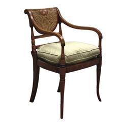  Sheraton style mahogany armchair, cane work back and seat, painted with flowers, collar turned out splayed supports, upholstered seat cushion   