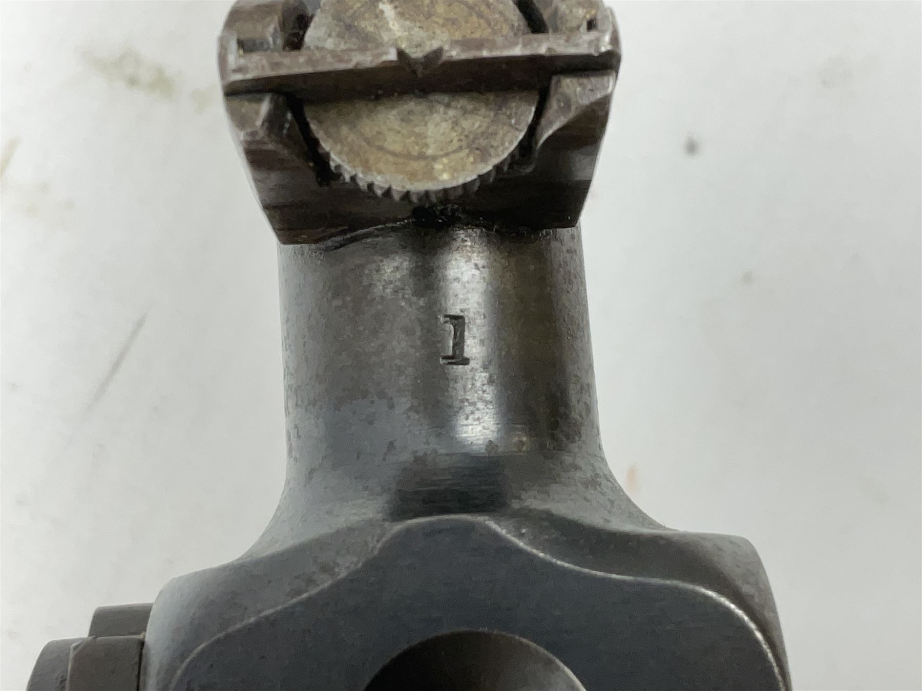 BSA .177 air rifle with top loading under lever action, walnut stock carved with chequered BSA logo to grip, serial no.A1203 L102cm