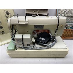 Jones 461 sewing machine, together with sewing equipment, various wicker baskets and a collection of cigarette cards 