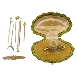 Edwardian 9ct gold seed pearl, star and swirl design brooch retailed by F. Appleby Retford boxed, four 9ct and 15ct gold stone set stick pins, 9ct gold propelling pencil and a 9ct gold brooch, all stamped, tested or hallmarked
