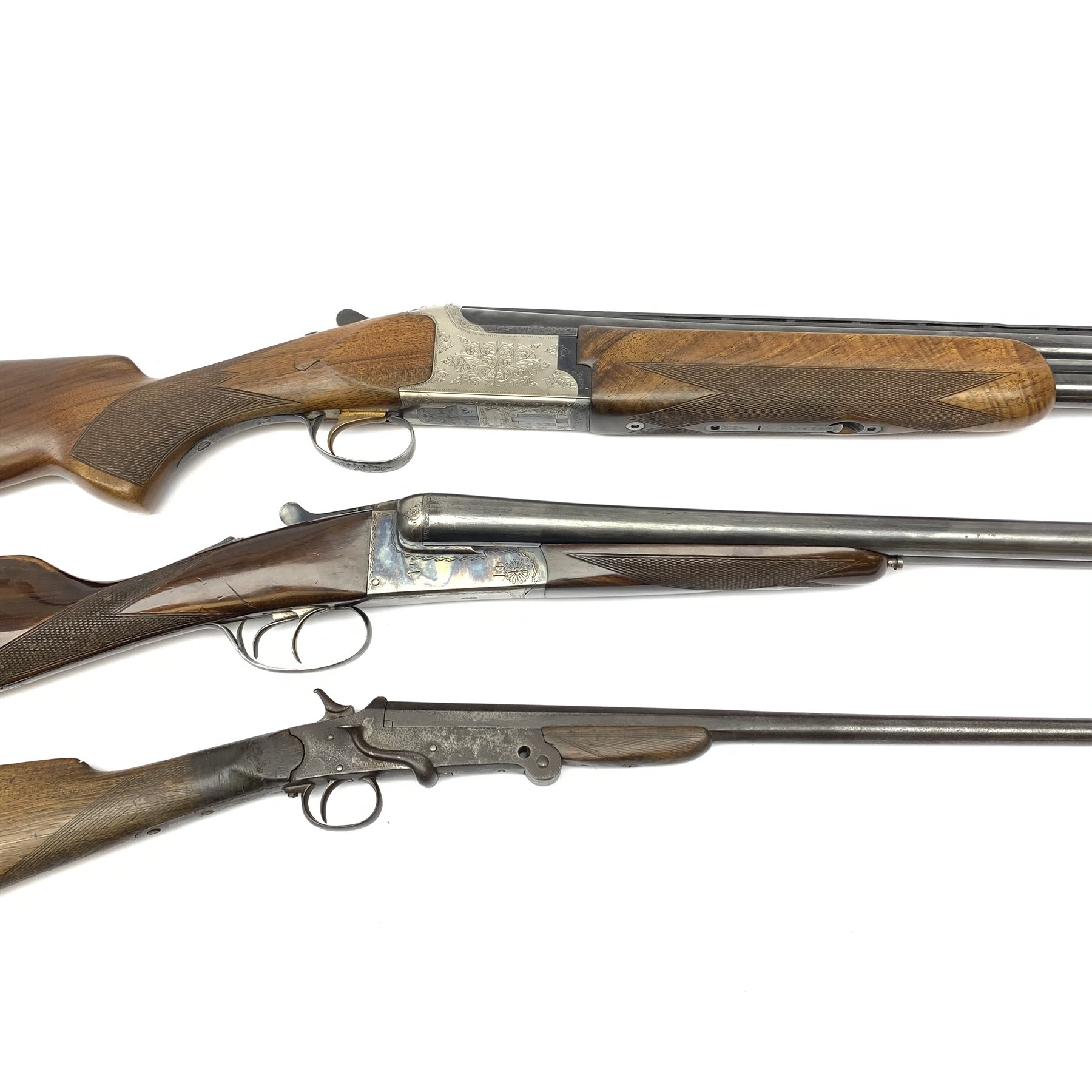 Miroku 12-bore box lock ejector over-and-under double barrel shotgun with walnut stock and 66cm barrels, No.2277306, L112cm overall; Sabel 12-bore box lock non-ejector side-by-side double barrel shotgun with 66cm barrels, No.62546, L108cm overall; Lambert Dumoulin folding .410 single barrel shotgun; and leather 12-bore cartridge belt (4) RFD ONLY