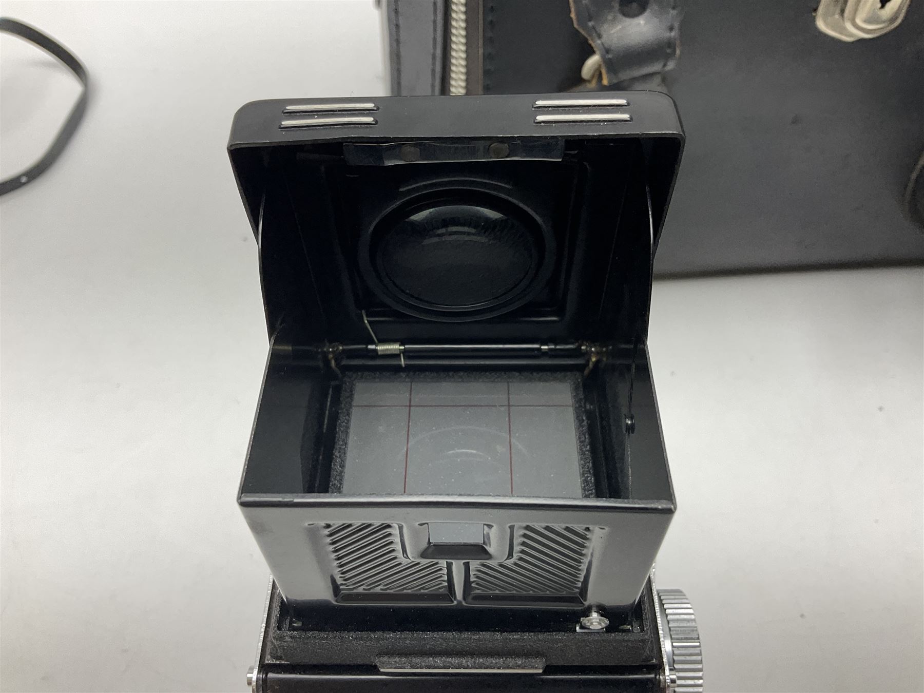 Yashica-A camera body, serial no. A4080073, with 'Yashikor 1:3.5 f=80mm' lens, serial no. 209272 and 'Yashikor 1:3.5f=80mm' lens, serial no 22942, together with Yashica TL-Electro camera body, serial no. 5054162 with 'Yashinon-DS 50mm 1:1.9  40056038