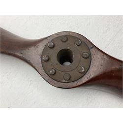 Early 20th century Avro 504 80HP Gnome laminated mahogany two-blade propeller with metal centre to the hub, stamped to the face of the hub 'AVRO Y80 80HP GNOME TYPE 504 & 504A A.I.D.29 A.I.D.32 1545' and to the sides of the hub '2744 DIA 1829 PITCH' and '1470'; traces of A.V. Roe & Co Ltd Manchester transfers to both blades L273.8cm; Auctioneer's Note: The Avro 504 was introduced in 1913 and was quickly taken up by the Royal Flying Corps as a trainer and observation machine; robust and versatile it remained in general service as a trainer until the late 1920s then widely for civilian use as a joy-rider and for stunt displays. The legendary RAF WWII ace, Douglas Bader, took instructions and would have had his first solo flight in just such a machine.