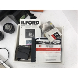 Large quantity of photo developing, dark room and photography equipment - quantity of Fogro 2'' x 2'' slide frames, PHILIPS movielight PSG125, Paterson 2 print forceps, atlas photo flash M3 clear, two Paterson 35mm developing tanks, Ilford photography paper 12'' x 16''and 8'' x 10'', Fujifilm photography paper 8'' x 10'' and 12'' x 16'', Rondinax 35U developing tank boxed, Simma Roller, two Ilford processing drums 30x40cm and 20x25cm, two other processing drums, Paterson 35mm contact proof printer, S&K 60D-C colour analyser etc... in three boxes