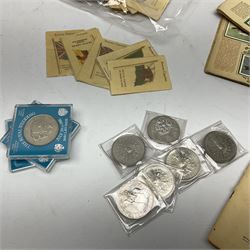 Quantity of Kensitas silk cigarette cards depicting world flags, together with albums of fish cigarette cards and quantity of crowns to include boxed examples