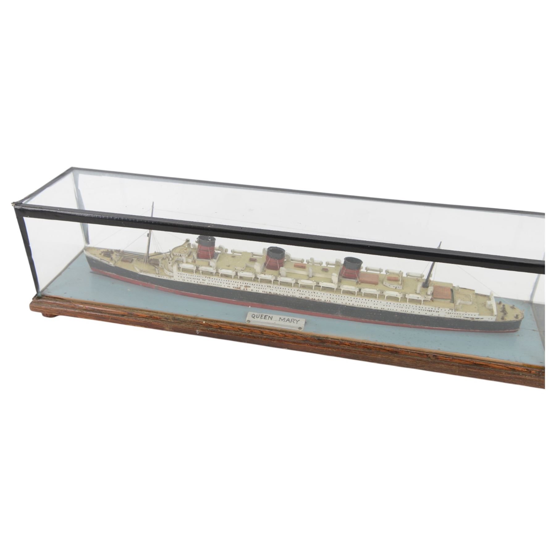 Scratch built model of RMS Queen Mary, in glazed wooden case, H17cm, L74cm