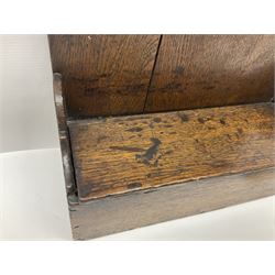 George III oak spoon rack and candle box, the rectangular backplate with shaped  pediment and two six aperture spoon racks, above a candlebox with hinged cover, with various brass spoons and a pair of brass candle snuffers, H56.5cm, W35cm, D14cm 