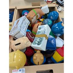Large collection of vintage money boxes and charity boxes, including plastic, wooden, tin and ceramic examples, of various designs including Paddington, Dunlop, Jellybabies, Meerkat, Halifax Houses, Pigs, etc