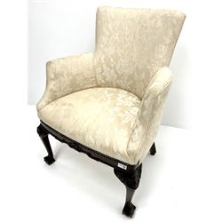 20th century mahogany framed armchair upholstered in beige damask, carved cabriole legs on ball and claw feet 