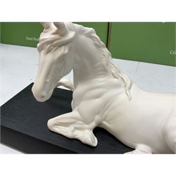 Five Beswick and Royal Doulton horse figures in matt white on black plinths, comprising of  Spirit of Affection no. 2689/2536, Springtime no.2837, Spirit of peace no.2916, Spirit of earth no.2914 and Spirit of the wild no. 183, together with a composite figure of a horse (6)