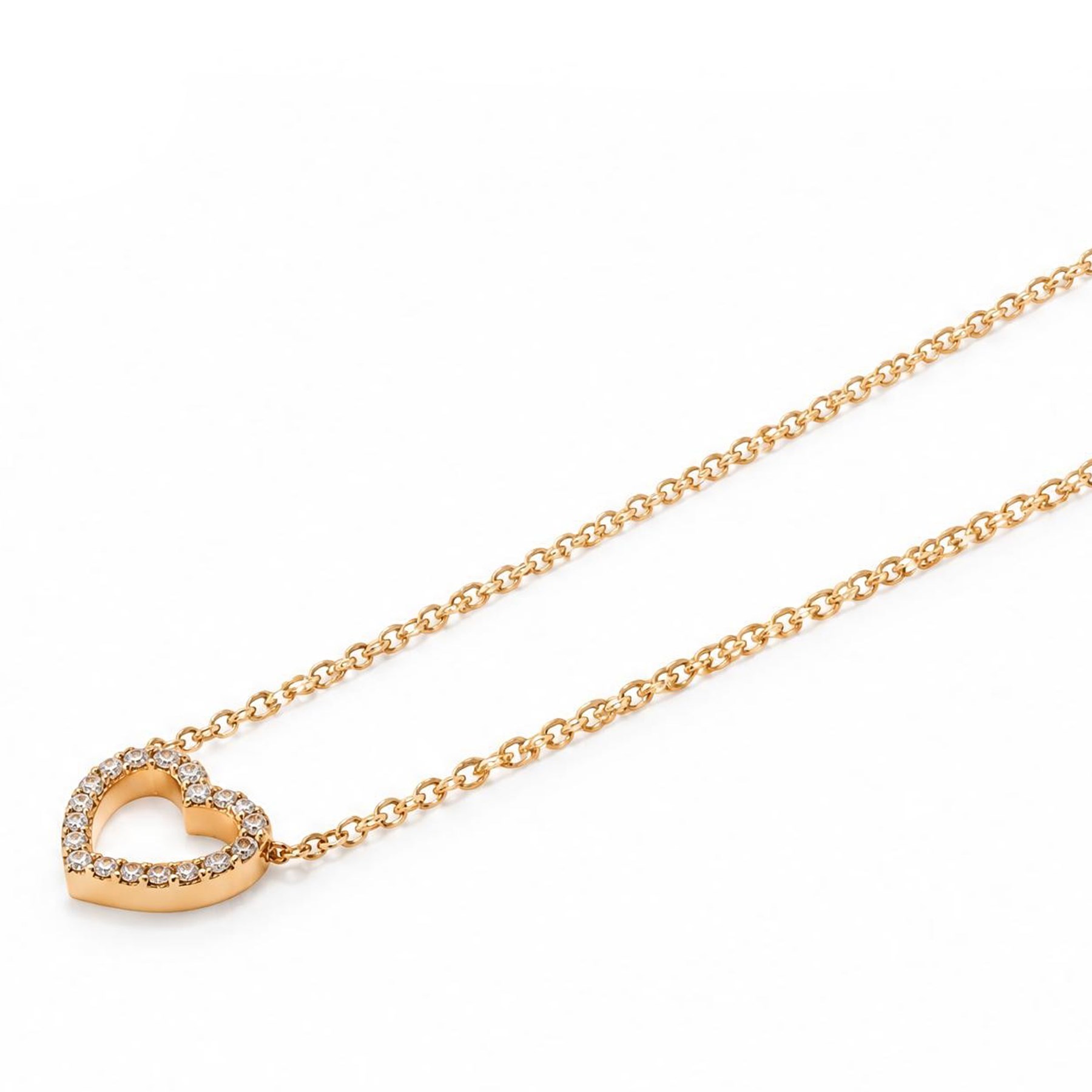 Tiffany & Co. 18ct gold 'Mini Metro' diamond heart pendant, stamped 750, boxed