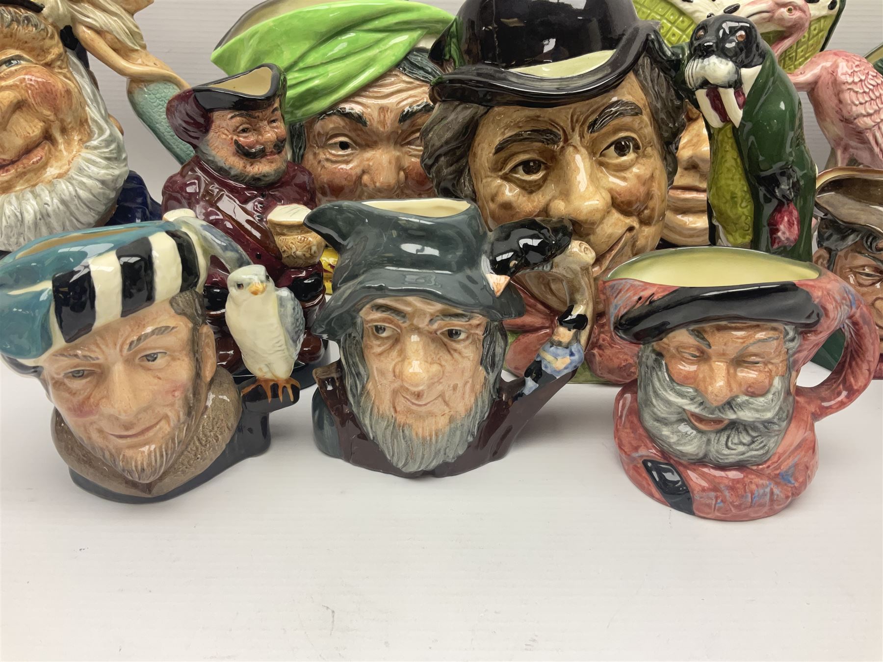 Twenty two Royal Doulton toby and character jugs, including Ugly Duchess D6599, Old Salt D6551, The Walrus & Carpenter D6600, Robin Hood D6534