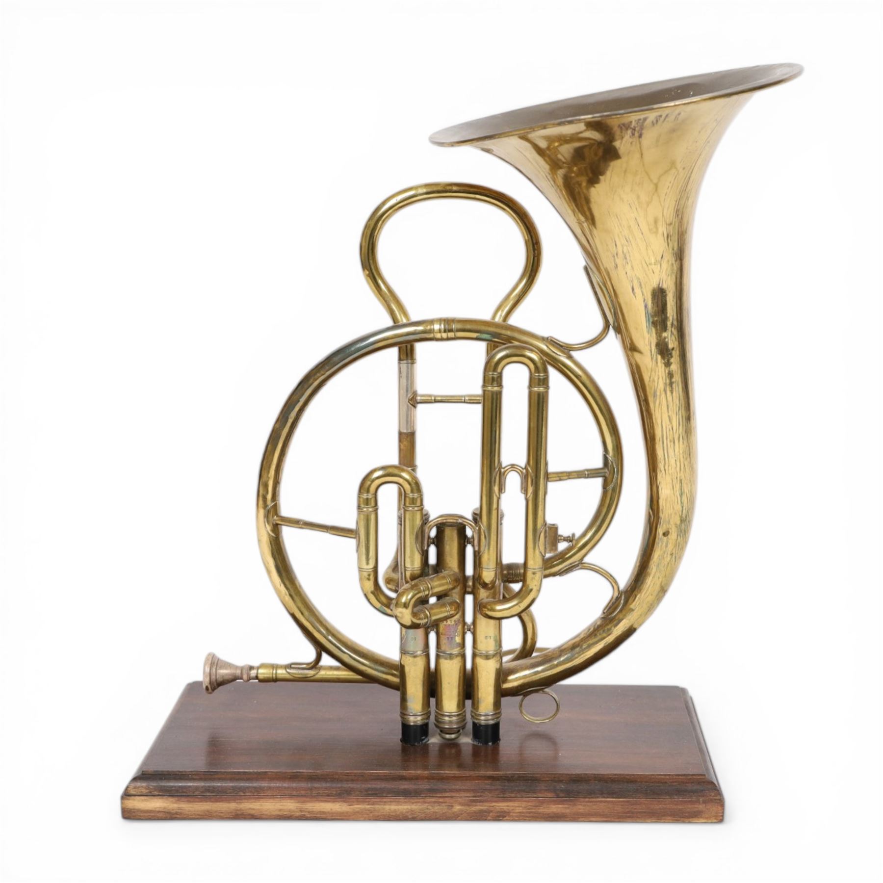 Boosey & Co Ltd French horn, converted into a table lamp, upon a wooden plinth, H45cm