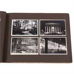 Two early to mid 20th century postcard albums, containing black and white and colour postcards of France, Turkey and Egypt, together with some personal photographs and newspaper clippings