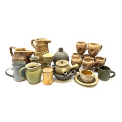 Studio pottery, to include Borgh pottery twin handled bowl, Hillstonia naturalistically modelled jug, set of seven mugs, jug and two vases.