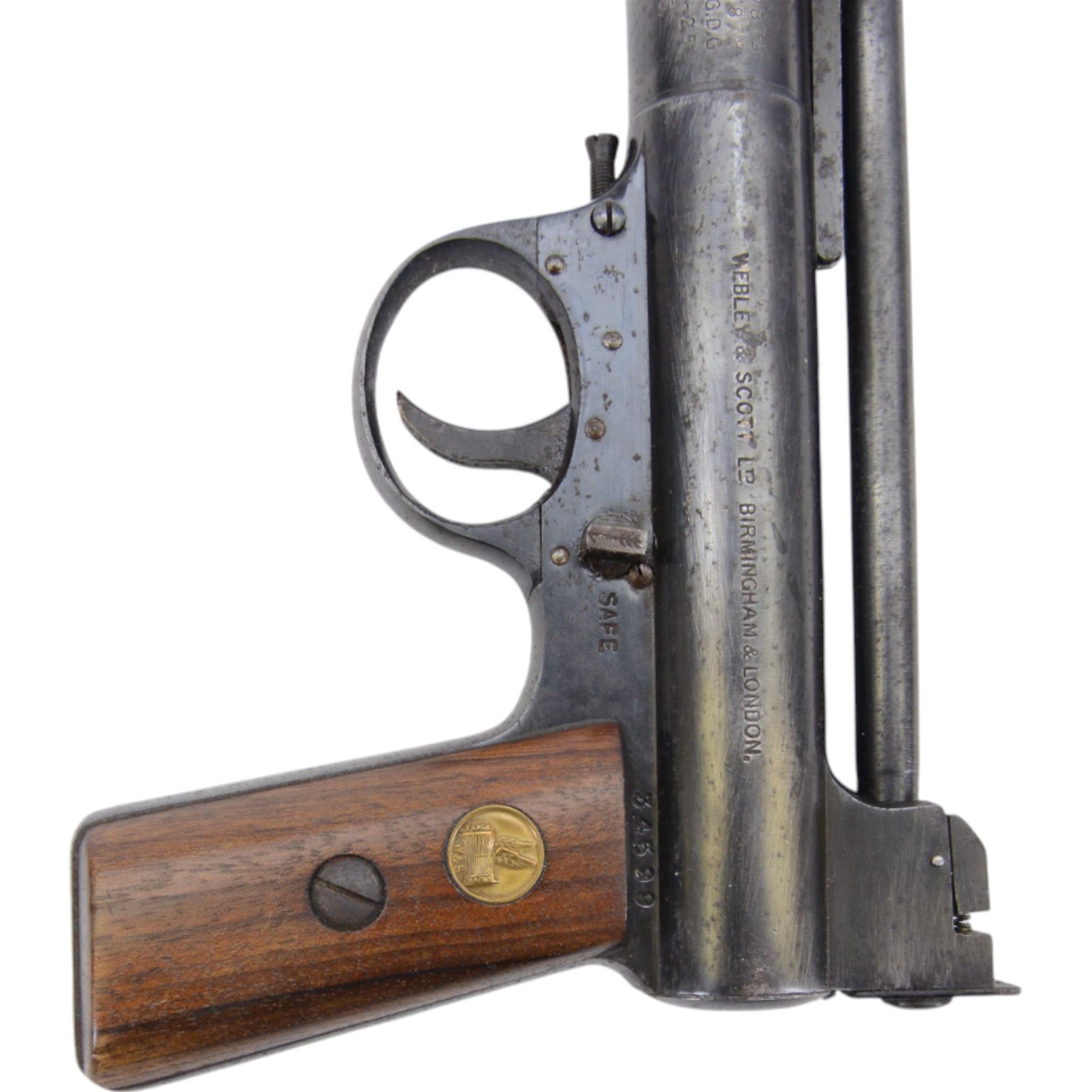 Webley Mark I .177 air pistol, circa 1924, serial number 34599, the air chamber marked Webley Air Pistol Mark I, Webley & Scott Ltd. Birmingham & London, with logo inset to the wooden grips, H13cm, L20cm