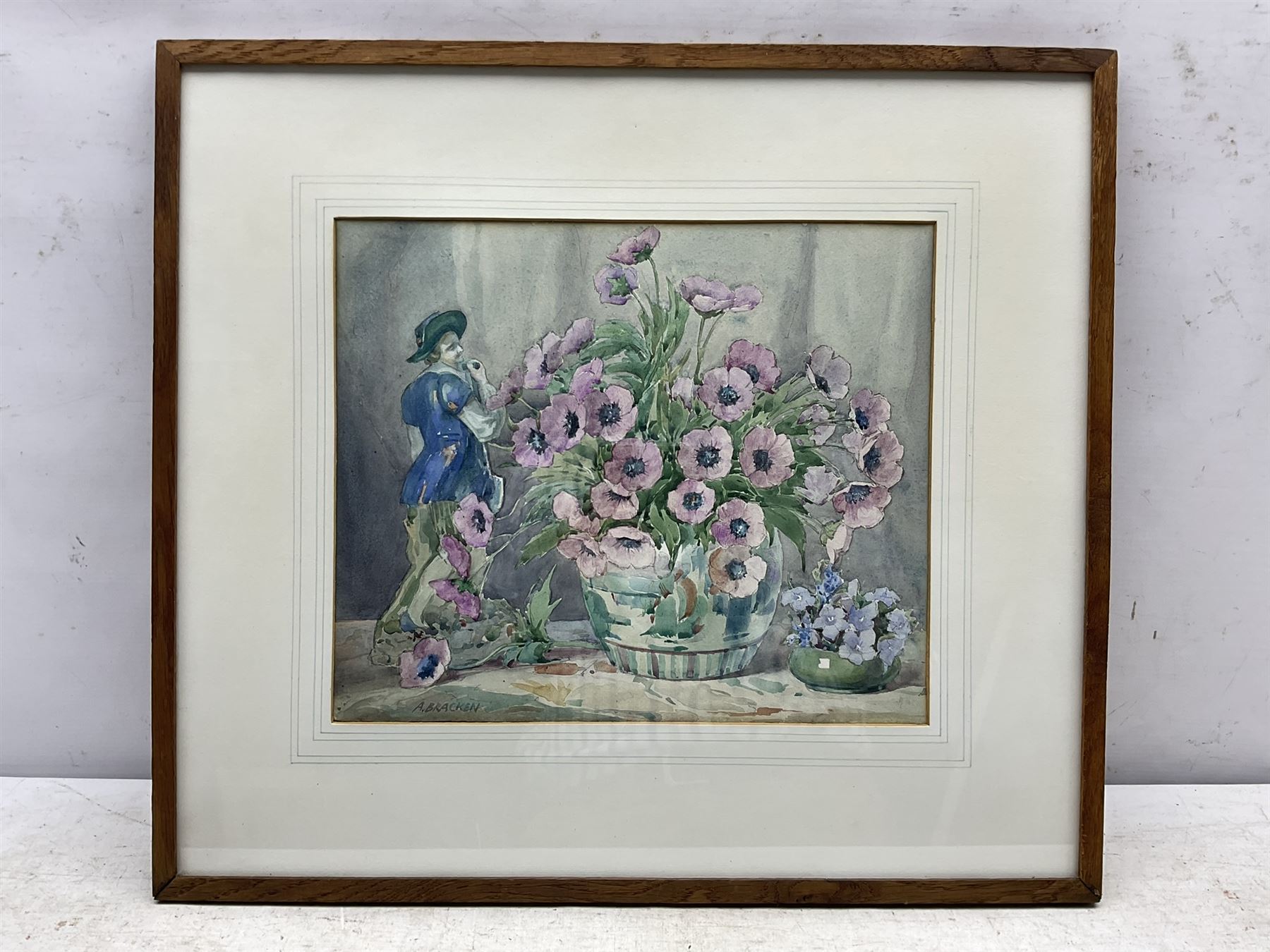Arthur Bracken (British early 20th century): 'Flowers and the Gardener', watercolour signed, titled on label verso with artist's Kendal address 27cm x 31cm