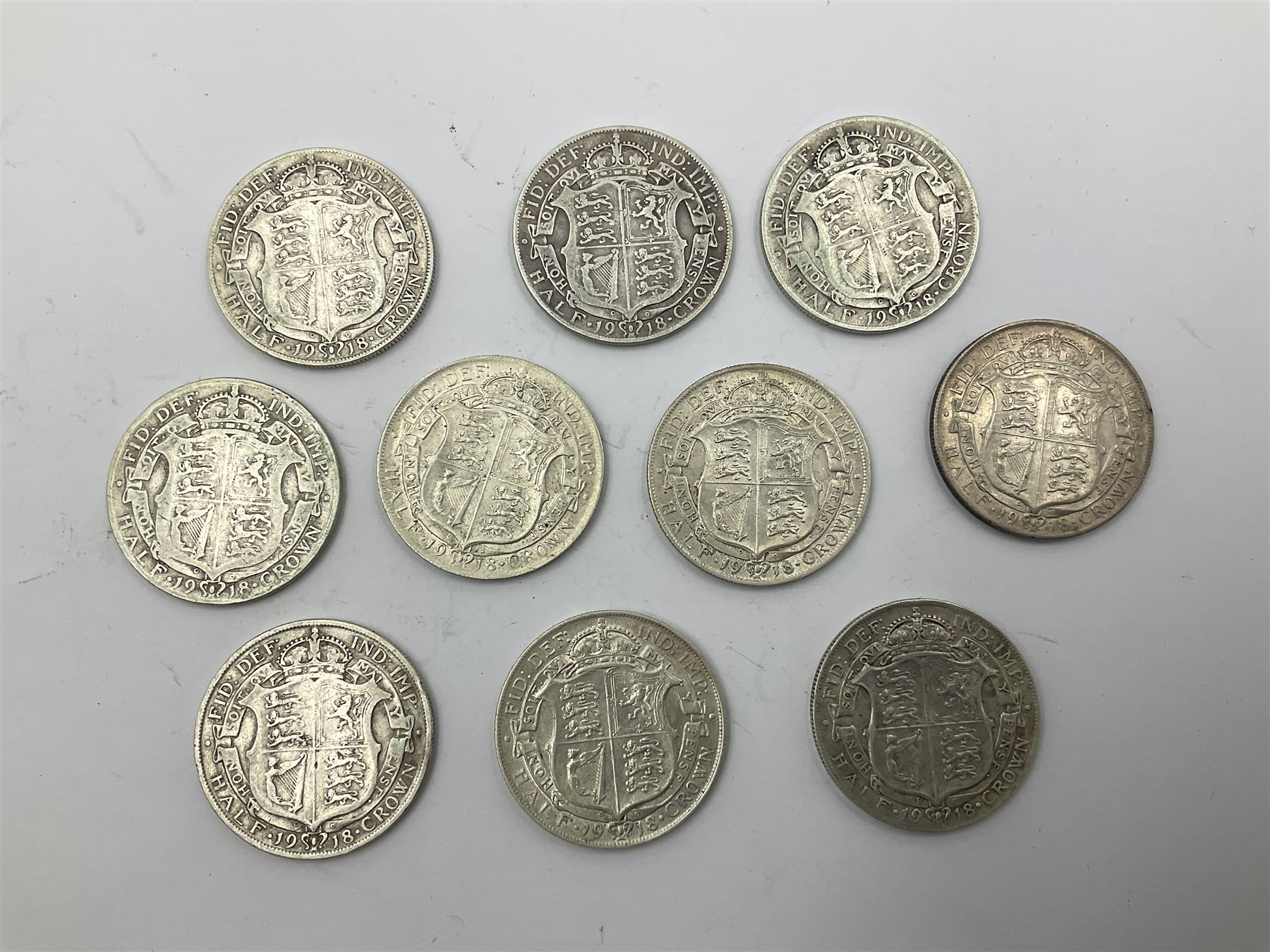 Ten King George V 1918 silver half crown coins