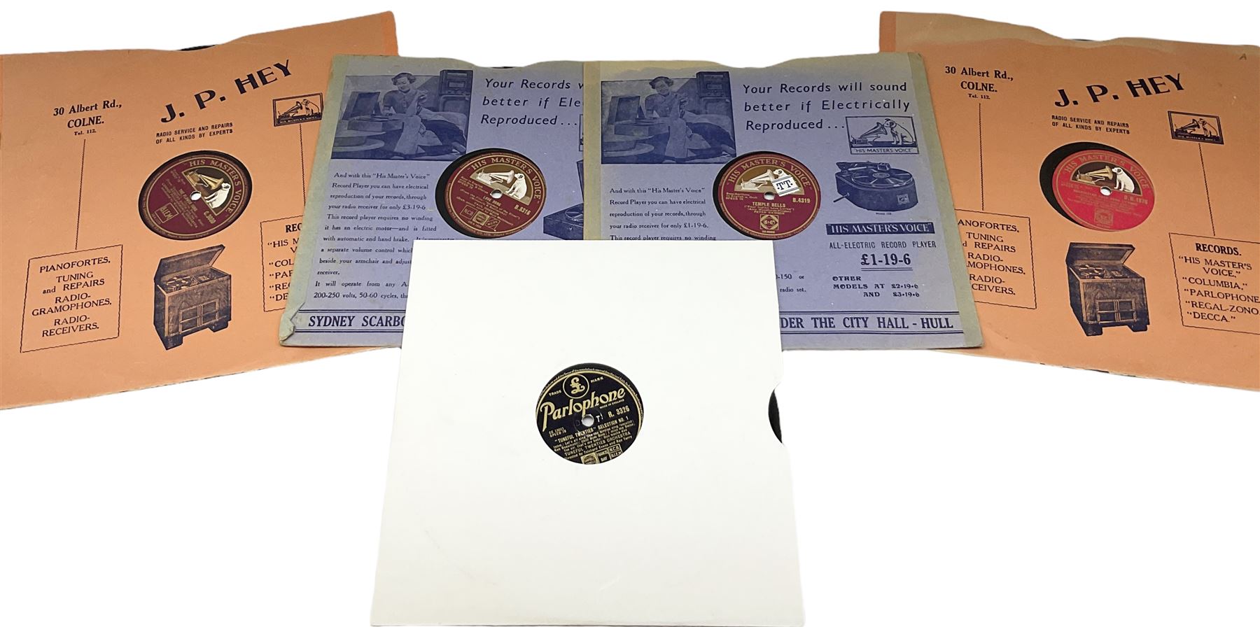 HMV portable wind up gramophone in a black case, together with a collection of records. 