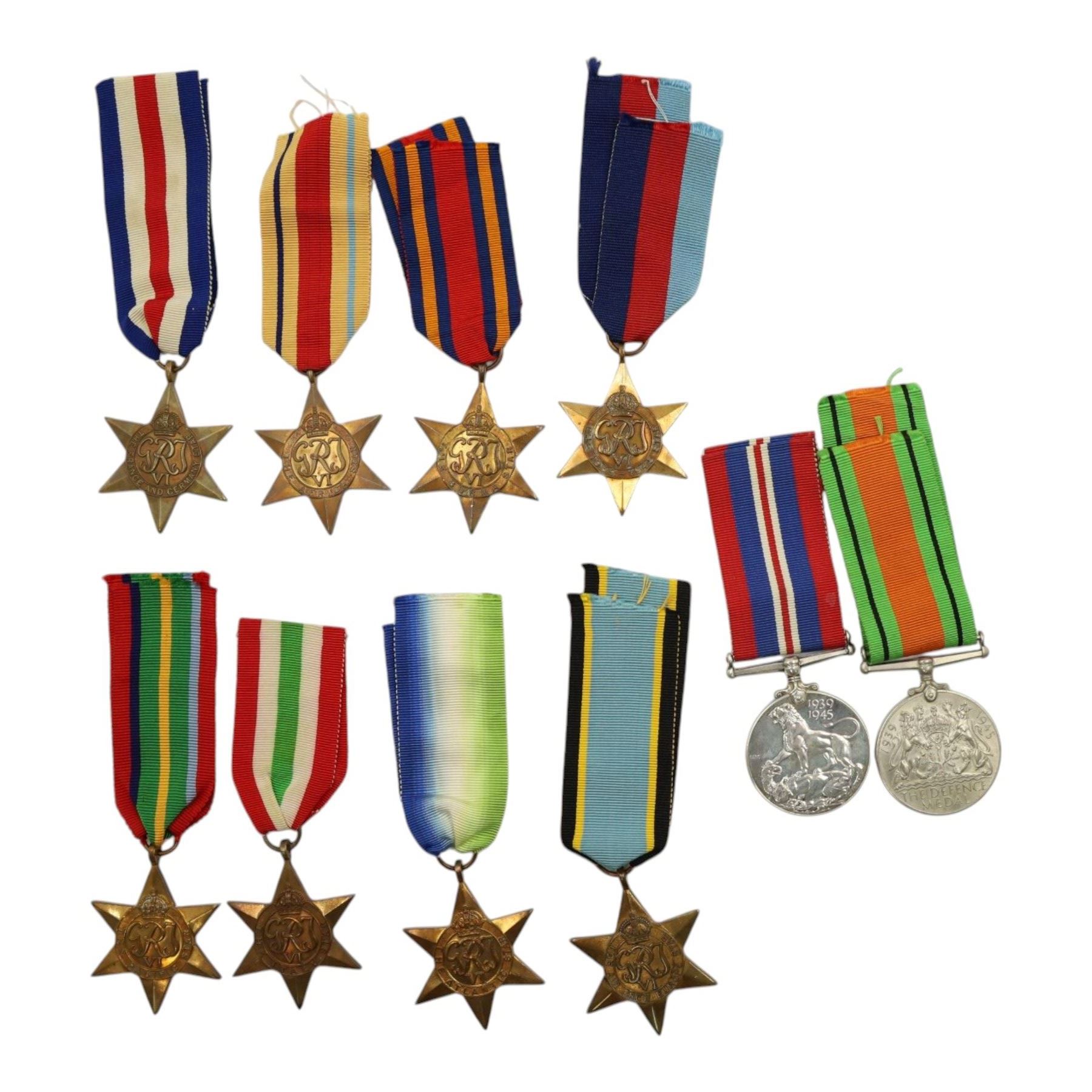 WWII British medals, comprising War medal, Defence medal, 1939-1945 Star, Burma Star, Atlantic Star, France and Germany Star, Italy Star, Pacific Star
