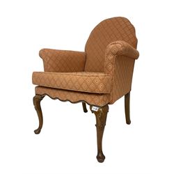 Georgian design walnut framed armchair, shaped back over scrolled arms, upholstered in coral lozenge patterned fabric over studded apron, on cabriole supports with shell decoration