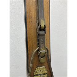 Pair of 1930s wooden skis, with painted metal runners beneath stamped Attenhofer, with retailers label for Ernst Gertsch Central Sports, L206cm