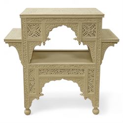 Early 20th century Indian carved altar table, white painted finish, the top with central f...