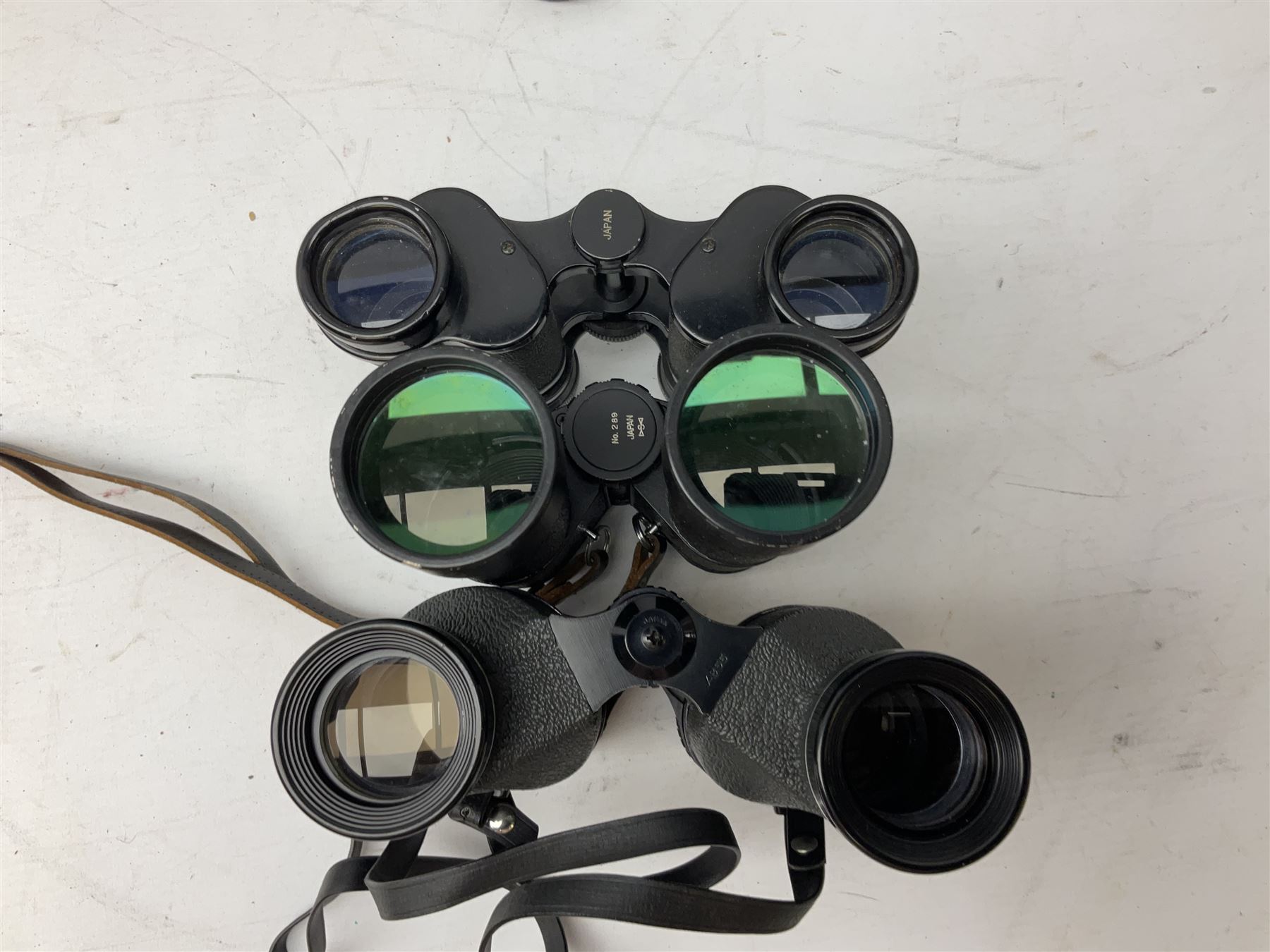 Eleven cased pairs of binoculars to include Summit 8x30,  Concord 8x40, Tasco no. 106 8x - 16x40, Chinon 10x50, Tokina 7x42 Field, Zoom 6x- 12x32 etc